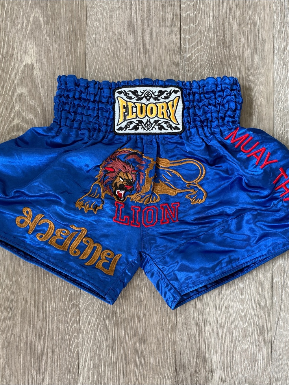 FLUORY Royal Blue Lion Muay Thai Kids Shorts